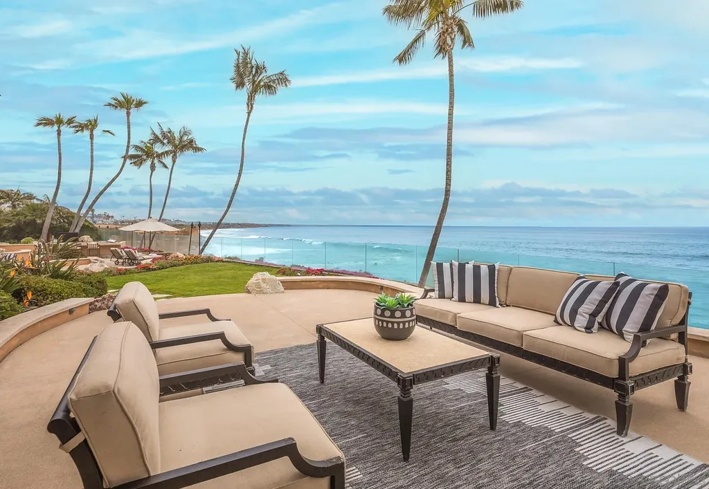 5305 Carlsbad Boulevard Home in Carlsbad, California. Experience the epitome of Southern California coastal living on this extraordinary 1.5-acre oceanfront property. With 165 feet of pristine coastline, panoramic Pacific Ocean views, private beach access, and stunning outdoor spaces, this 5-bedroom estate offers unparalleled luxury.