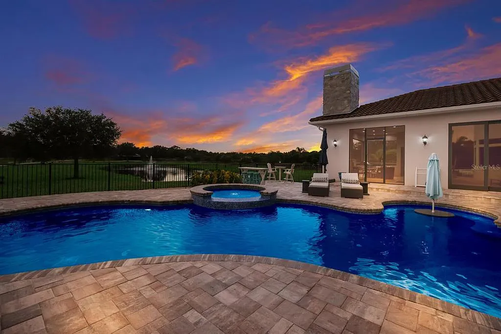5952 Vanderipe Road Home in Sarasota, Florida. Discover luxurious country living at its finest in this custom-designed home nestled on a sprawling equestrian estate in Myakka Valley Ranches. With over 12 acres of land, two separate lots, and a meticulously crafted residence boasting modern amenities, this property offers a canvas for your dreams to flourish.