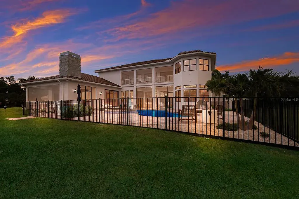 5952 Vanderipe Road Home in Sarasota, Florida. Discover luxurious country living at its finest in this custom-designed home nestled on a sprawling equestrian estate in Myakka Valley Ranches. With over 12 acres of land, two separate lots, and a meticulously crafted residence boasting modern amenities, this property offers a canvas for your dreams to flourish.