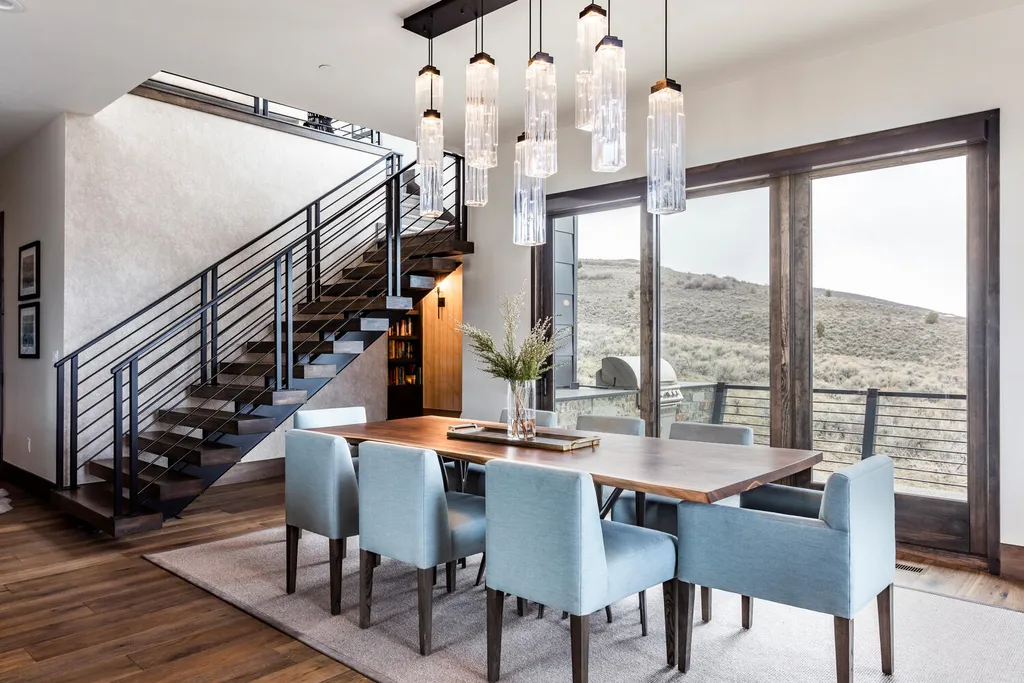 6110 E Blue Wing Loop Home in Kamas, Utah. Immerse yourself in the grandeur of Utah's natural beauty at 6110 E Blue Wing in Victory Ranch. This modern mountain home offers breathtaking 180° views of mountains, Deer Valley ski resort, and rock cliffs from every room.