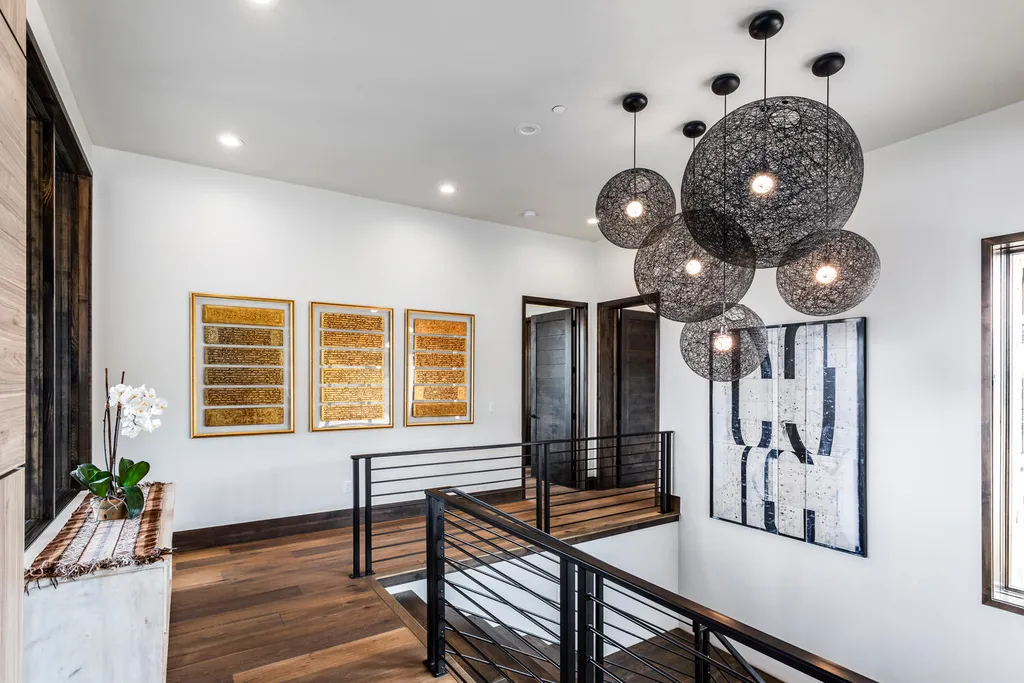 6110 E Blue Wing Loop Home in Kamas, Utah. Immerse yourself in the grandeur of Utah's natural beauty at 6110 E Blue Wing in Victory Ranch. This modern mountain home offers breathtaking 180° views of mountains, Deer Valley ski resort, and rock cliffs from every room.