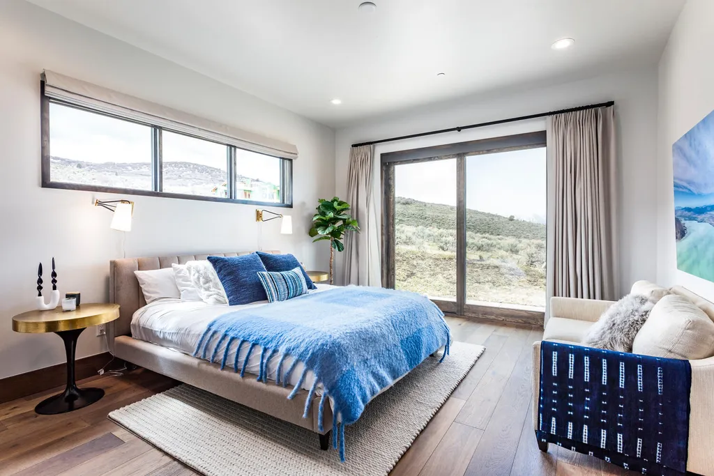 6110 E Blue Wing Loop Home in Kamas, Utah. Immerse yourself in the grandeur of Utah's natural beauty at 6110 E Blue Wing in Victory Ranch. This modern mountain home offers breathtaking 180° views of mountains, Deer Valley ski resort, and rock cliffs from every room.