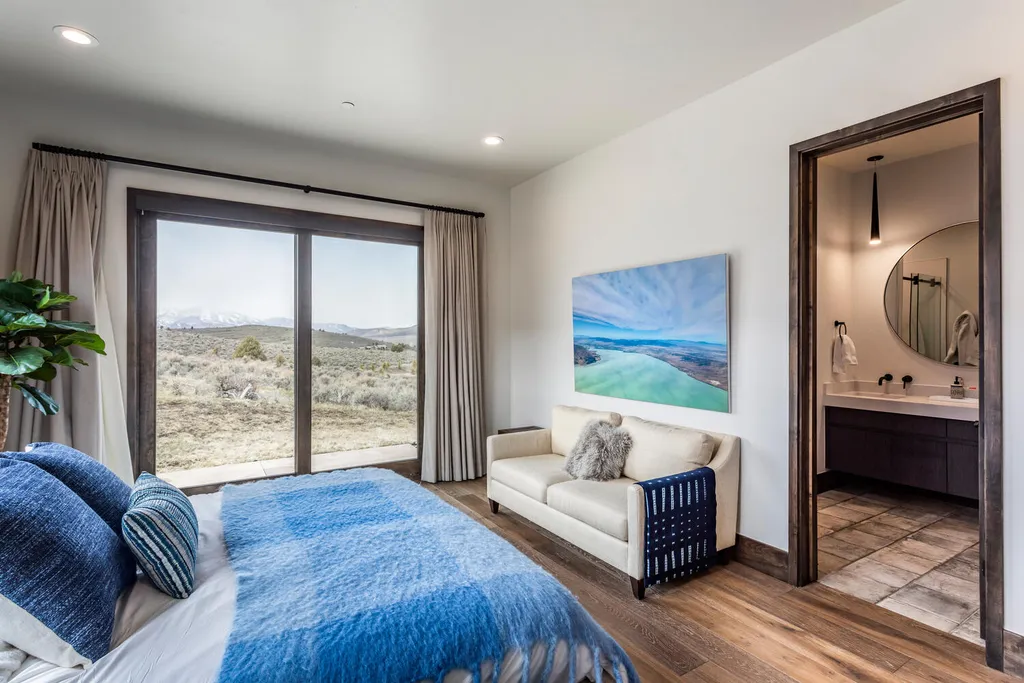 6110 E Blue Wing Loop Home in Kamas, Utah. Immerse yourself in the grandeur of Utah's natural beauty at 6110 E Blue Wing in Victory Ranch. This modern mountain home offers breathtaking 180° views of mountains, Deer Valley ski resort, and rock cliffs from every room.