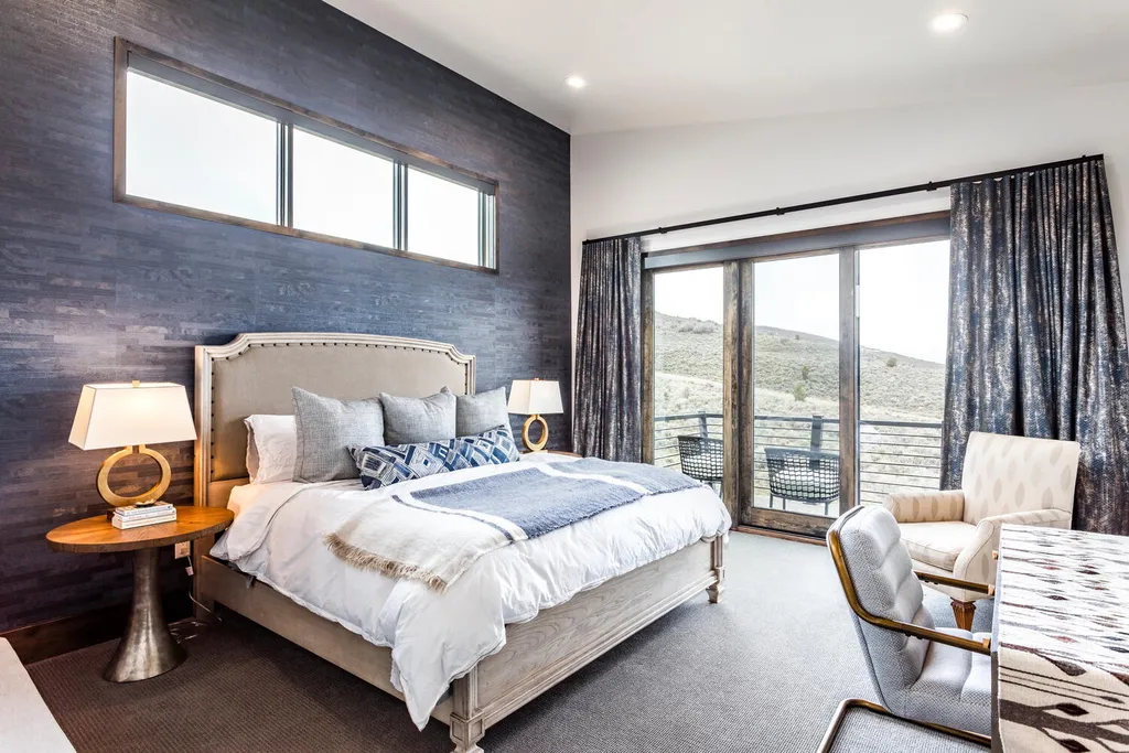 6110 E Blue Wing Loop Home in Kamas, Utah. Immerse yourself in the grandeur of Utah's natural beauty at 6110 E Blue Wing in Victory Ranch. This modern mountain home offers breathtaking 180° views of mountains, Deer Valley ski resort, and rock cliffs from every room.