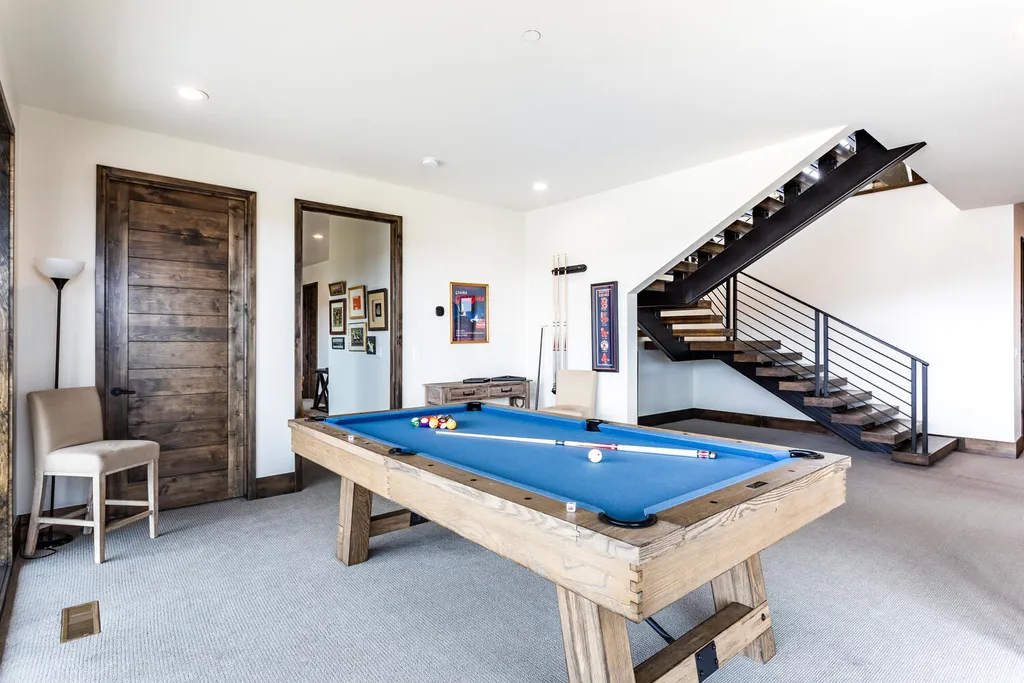 6110 E Blue Wing Loop Home in Kamas, Utah. Immerse yourself in the grandeur of Utah's natural beauty at 6110 E Blue Wing in Victory Ranch. This modern mountain home offers breathtaking 180° views of mountains, Deer Valley ski resort, and rock cliffs from every room.