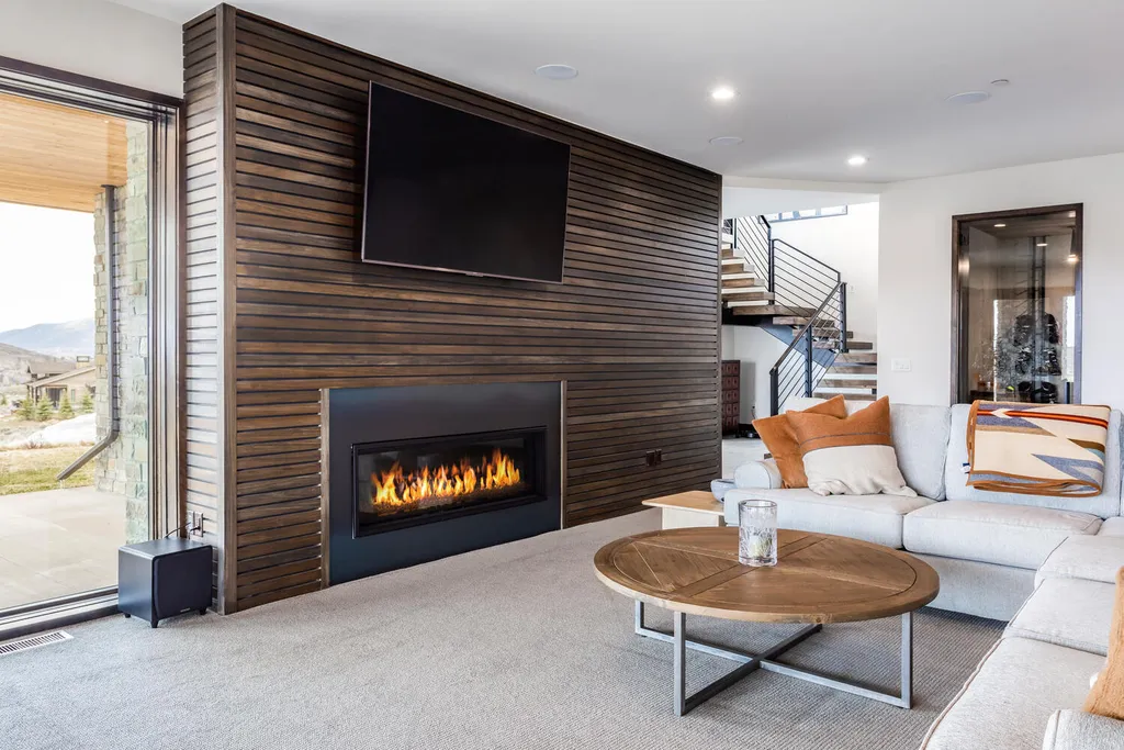 6110 E Blue Wing Loop Home in Kamas, Utah. Immerse yourself in the grandeur of Utah's natural beauty at 6110 E Blue Wing in Victory Ranch. This modern mountain home offers breathtaking 180° views of mountains, Deer Valley ski resort, and rock cliffs from every room.