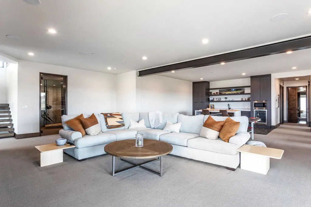 6110 E Blue Wing Loop Home in Kamas, Utah. Immerse yourself in the grandeur of Utah's natural beauty at 6110 E Blue Wing in Victory Ranch. This modern mountain home offers breathtaking 180° views of mountains, Deer Valley ski resort, and rock cliffs from every room.