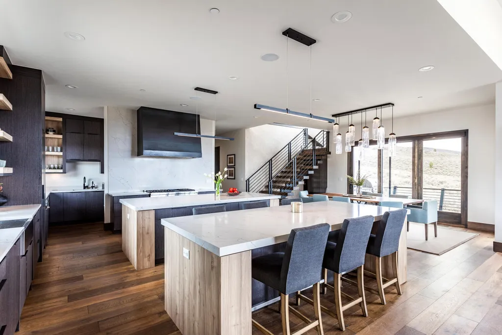 6110 E Blue Wing Loop Home in Kamas, Utah. Immerse yourself in the grandeur of Utah's natural beauty at 6110 E Blue Wing in Victory Ranch. This modern mountain home offers breathtaking 180° views of mountains, Deer Valley ski resort, and rock cliffs from every room.