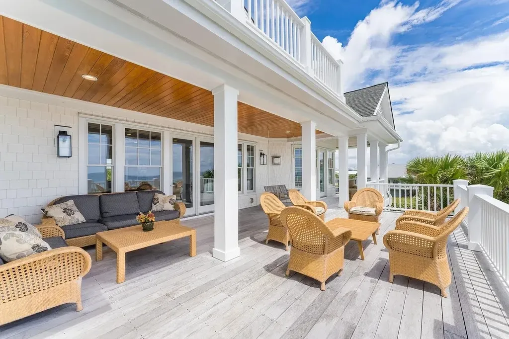 7 Cowrie Lane Home in Wrightsville Beach, North Carolina. Discover the epitome of luxurious coastal living at this expansive oceanfront estate in Wrightsville Beach. Set on nearly one acre of pristine land, this majestic property features a resort-style pool, lush landscaping, and private beach access. 