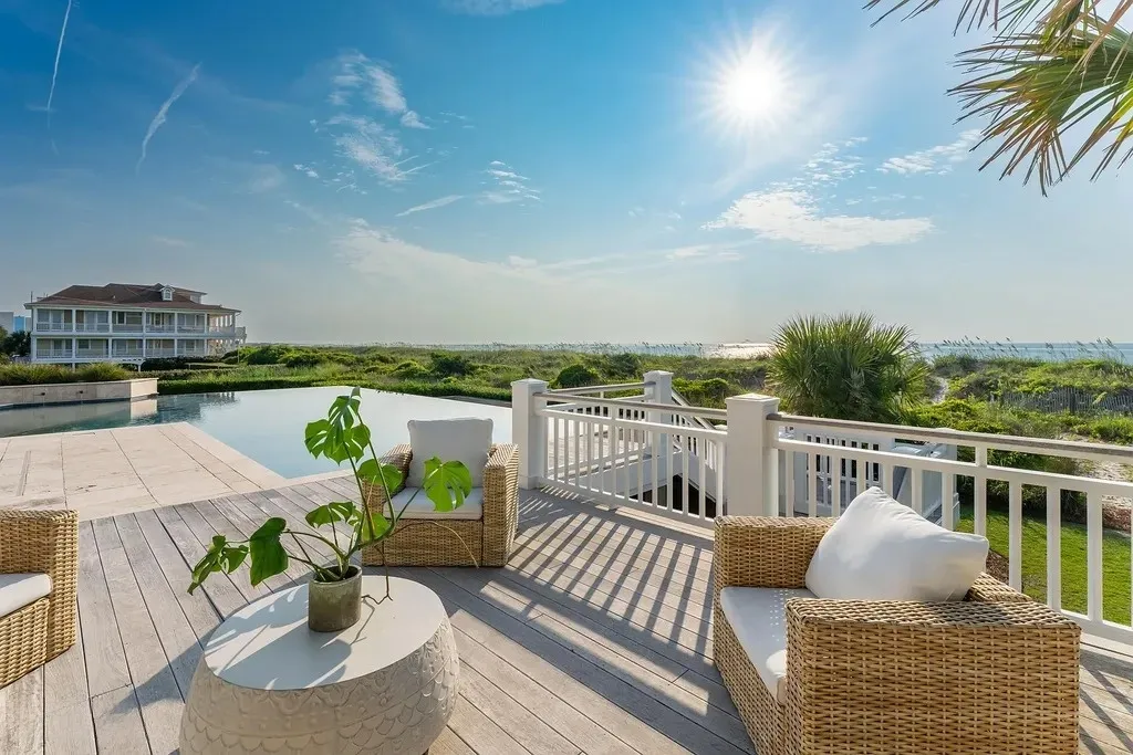7 Cowrie Lane Home in Wrightsville Beach, North Carolina. Discover the epitome of luxurious coastal living at this expansive oceanfront estate in Wrightsville Beach. Set on nearly one acre of pristine land, this majestic property features a resort-style pool, lush landscaping, and private beach access. 