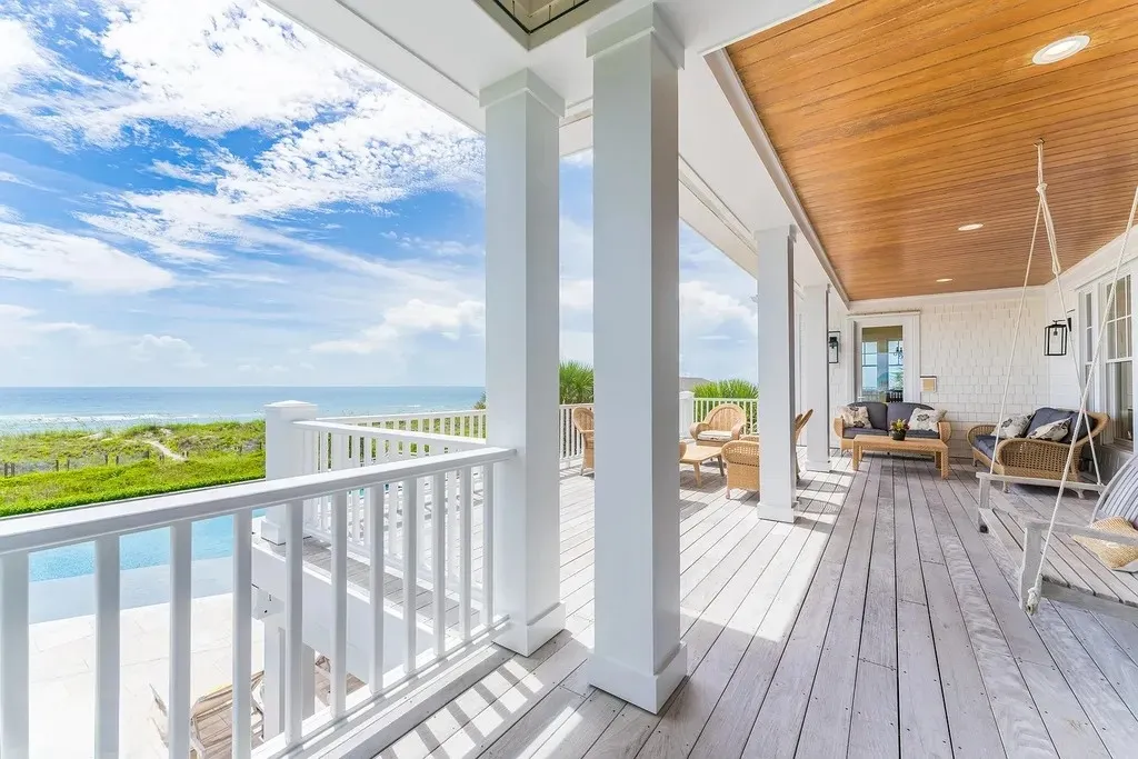 7 Cowrie Lane Home in Wrightsville Beach, North Carolina. Discover the epitome of luxurious coastal living at this expansive oceanfront estate in Wrightsville Beach. Set on nearly one acre of pristine land, this majestic property features a resort-style pool, lush landscaping, and private beach access. 