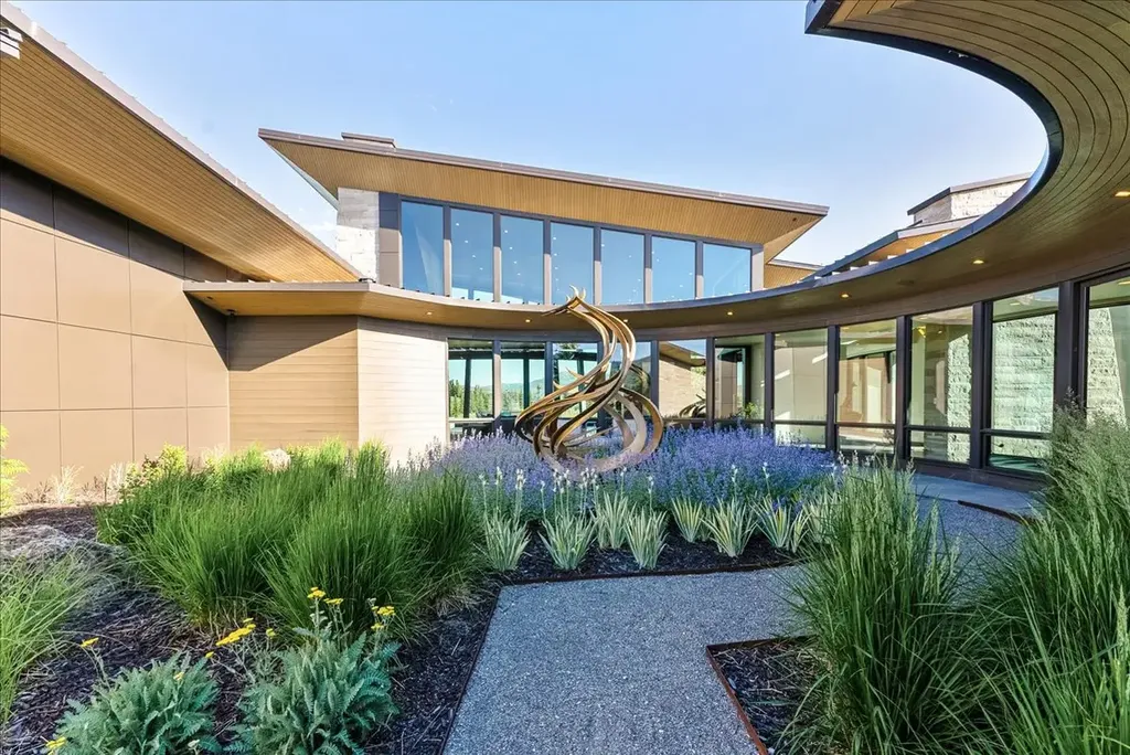 800 Hollyhock Street 142 Home in Park City, Utah. Indulge in the essence of opulent living as you step into this meticulously designed single-level haven, gracing the 7th hole of the renowned Glenwild Golf Course. Crafted by the visionary architect Michael Upwall and impeccably executed by Hess Construction, this brand-new residence epitomizes the art of effortless living.
