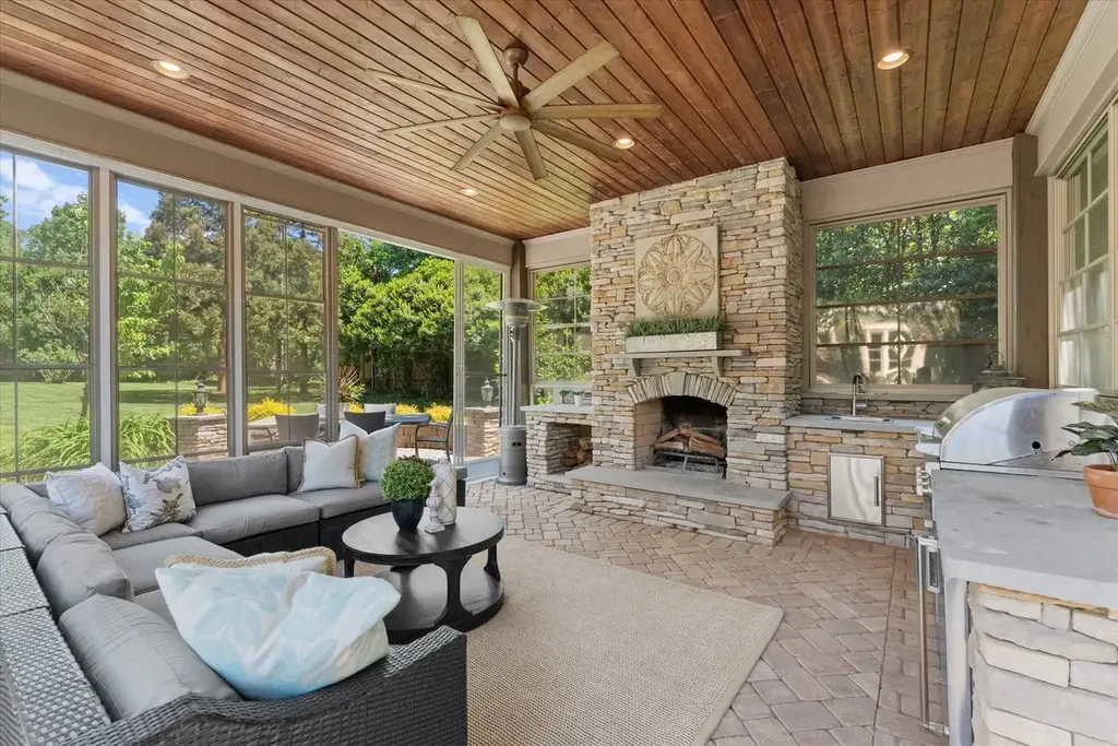 8600 Fairview Road Home in Charlotte, North Carolina. Discover the epitome of luxury living at Fairview Manor Estate in the coveted Carmel Park neighborhood. This gated 1.27-acre property boasts a stunning great room with a 2-story fireplace, exquisite millwork, and floor-to-ceiling windows. 