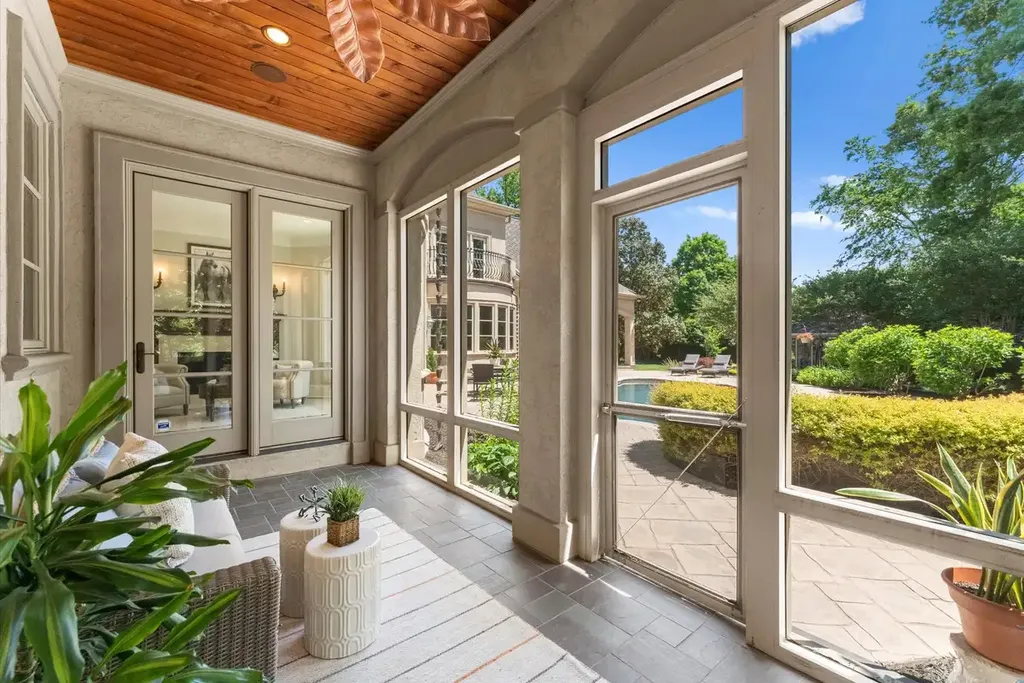 8600 Fairview Road Home in Charlotte, North Carolina. Discover the epitome of luxury living at Fairview Manor Estate in the coveted Carmel Park neighborhood. This gated 1.27-acre property boasts a stunning great room with a 2-story fireplace, exquisite millwork, and floor-to-ceiling windows. 