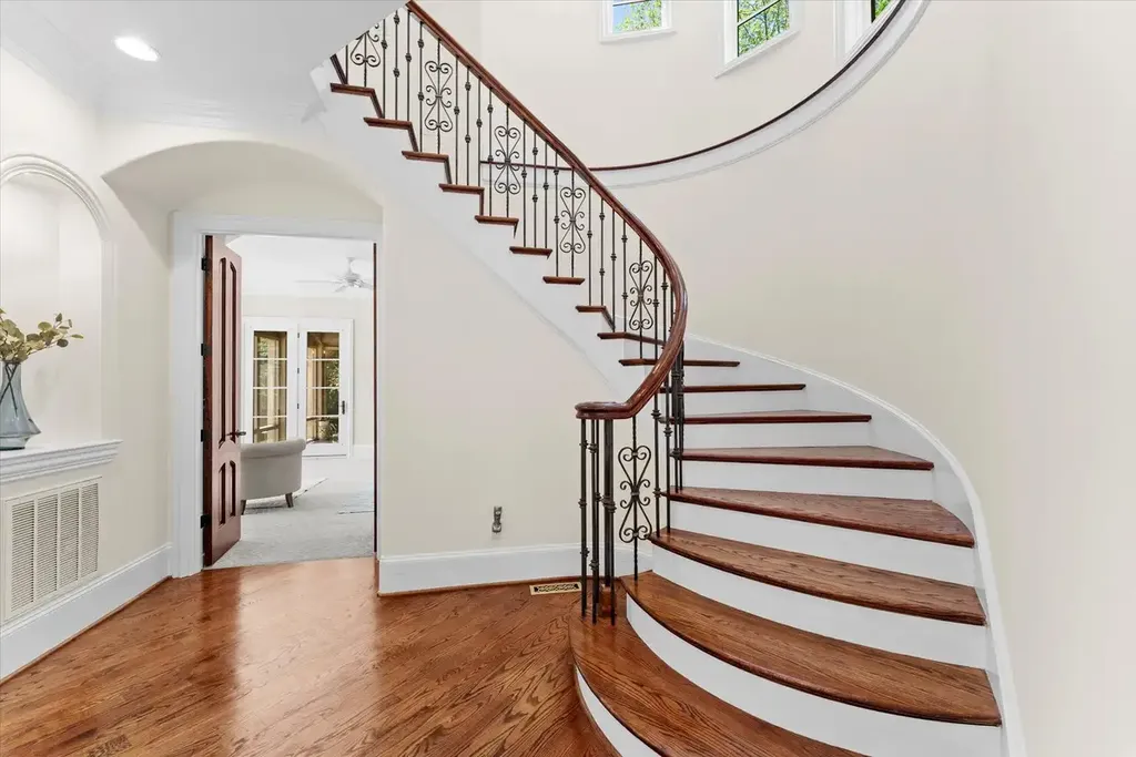 8600 Fairview Road Home in Charlotte, North Carolina. Discover the epitome of luxury living at Fairview Manor Estate in the coveted Carmel Park neighborhood. This gated 1.27-acre property boasts a stunning great room with a 2-story fireplace, exquisite millwork, and floor-to-ceiling windows. 