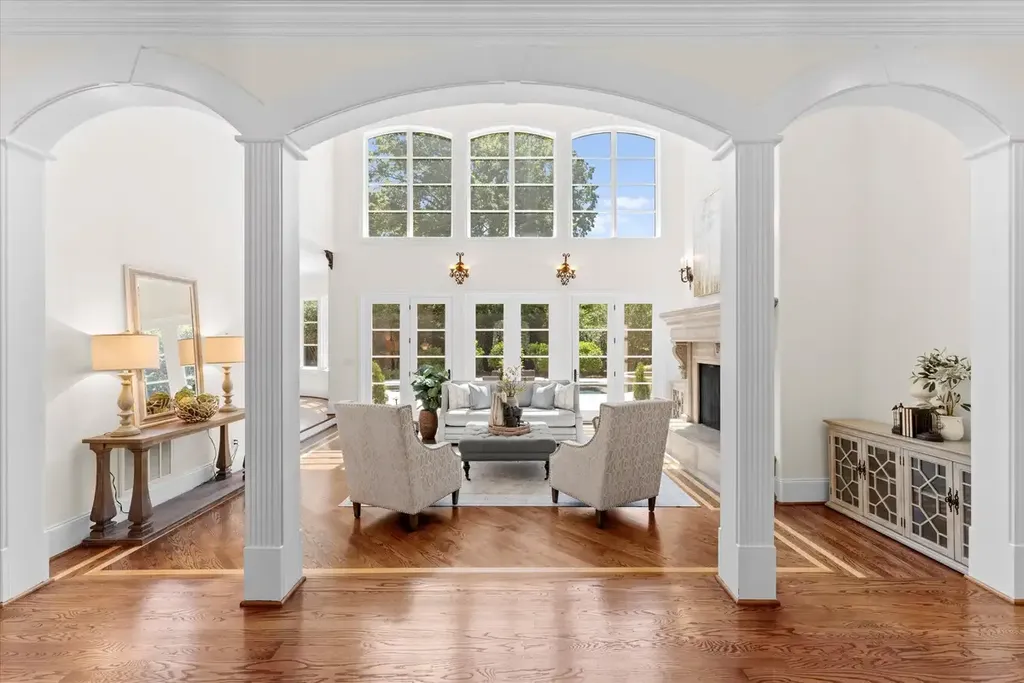 8600 Fairview Road Home in Charlotte, North Carolina. Discover the epitome of luxury living at Fairview Manor Estate in the coveted Carmel Park neighborhood. This gated 1.27-acre property boasts a stunning great room with a 2-story fireplace, exquisite millwork, and floor-to-ceiling windows. 