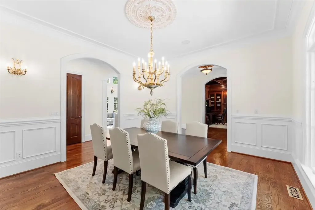 8600 Fairview Road Home in Charlotte, North Carolina. Discover the epitome of luxury living at Fairview Manor Estate in the coveted Carmel Park neighborhood. This gated 1.27-acre property boasts a stunning great room with a 2-story fireplace, exquisite millwork, and floor-to-ceiling windows. 