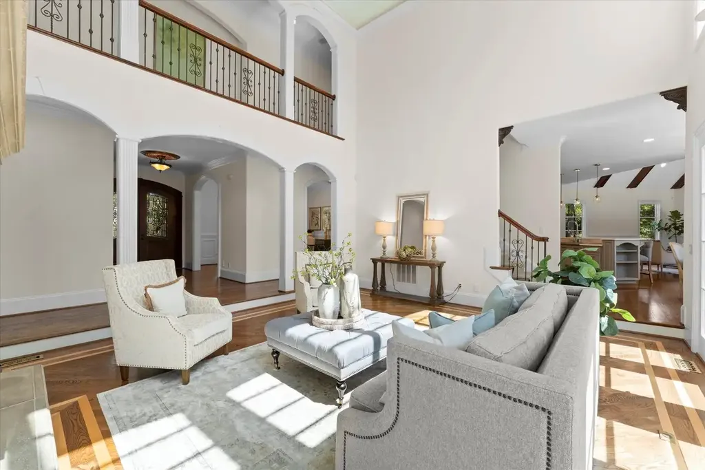 8600 Fairview Road Home in Charlotte, North Carolina. Discover the epitome of luxury living at Fairview Manor Estate in the coveted Carmel Park neighborhood. This gated 1.27-acre property boasts a stunning great room with a 2-story fireplace, exquisite millwork, and floor-to-ceiling windows. 