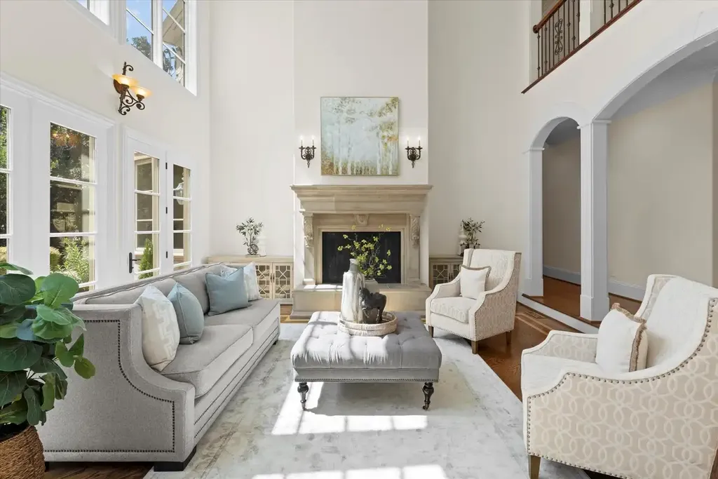 8600 Fairview Road Home in Charlotte, North Carolina. Discover the epitome of luxury living at Fairview Manor Estate in the coveted Carmel Park neighborhood. This gated 1.27-acre property boasts a stunning great room with a 2-story fireplace, exquisite millwork, and floor-to-ceiling windows. 