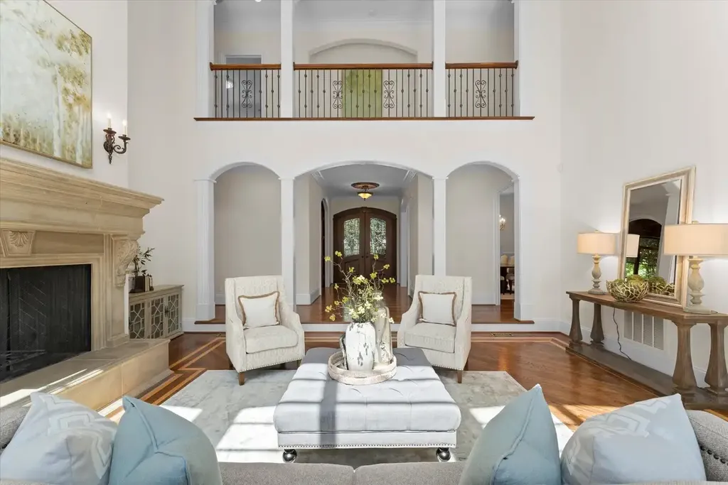 8600 Fairview Road Home in Charlotte, North Carolina. Discover the epitome of luxury living at Fairview Manor Estate in the coveted Carmel Park neighborhood. This gated 1.27-acre property boasts a stunning great room with a 2-story fireplace, exquisite millwork, and floor-to-ceiling windows. 