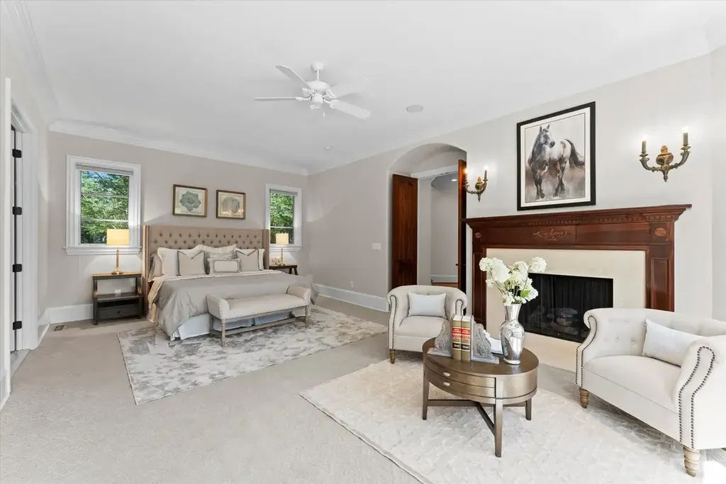 8600 Fairview Road Home in Charlotte, North Carolina. Discover the epitome of luxury living at Fairview Manor Estate in the coveted Carmel Park neighborhood. This gated 1.27-acre property boasts a stunning great room with a 2-story fireplace, exquisite millwork, and floor-to-ceiling windows. 