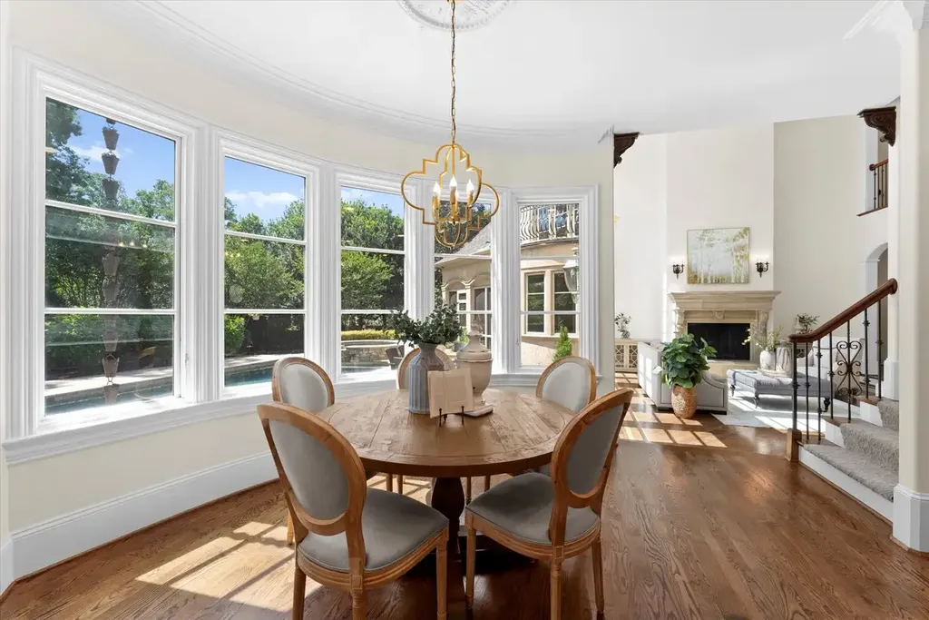 8600 Fairview Road Home in Charlotte, North Carolina. Discover the epitome of luxury living at Fairview Manor Estate in the coveted Carmel Park neighborhood. This gated 1.27-acre property boasts a stunning great room with a 2-story fireplace, exquisite millwork, and floor-to-ceiling windows. 