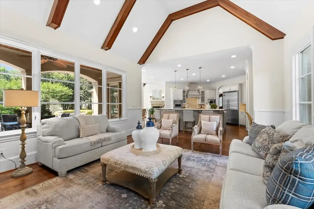 8600 Fairview Road Home in Charlotte, North Carolina. Discover the epitome of luxury living at Fairview Manor Estate in the coveted Carmel Park neighborhood. This gated 1.27-acre property boasts a stunning great room with a 2-story fireplace, exquisite millwork, and floor-to-ceiling windows. 