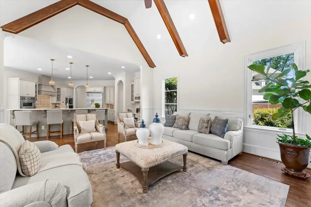 8600 Fairview Road Home in Charlotte, North Carolina. Discover the epitome of luxury living at Fairview Manor Estate in the coveted Carmel Park neighborhood. This gated 1.27-acre property boasts a stunning great room with a 2-story fireplace, exquisite millwork, and floor-to-ceiling windows. 