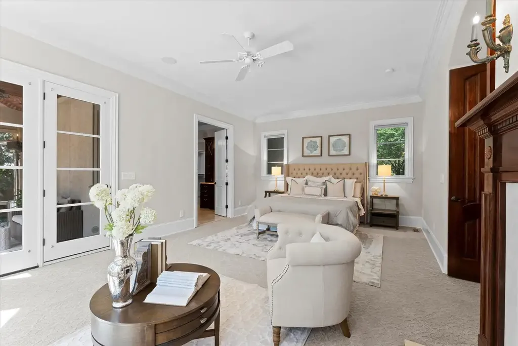 8600 Fairview Road Home in Charlotte, North Carolina. Discover the epitome of luxury living at Fairview Manor Estate in the coveted Carmel Park neighborhood. This gated 1.27-acre property boasts a stunning great room with a 2-story fireplace, exquisite millwork, and floor-to-ceiling windows. 