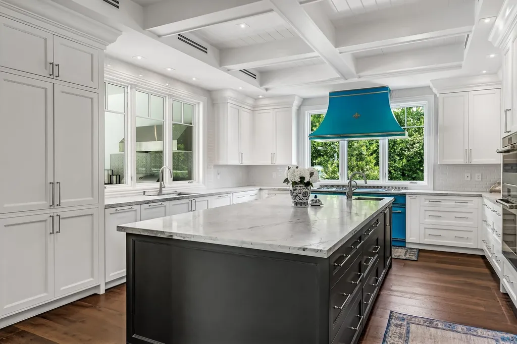 8840 SW 61st Court Home in Pinecrest, Florida. Explore this exquisite European-inspired home in N. Pinecrest, boasting 7 bedrooms and 7.5 bathrooms. From the formal living room with a wine cellar to the showstopper kitchen, this residence exudes elegance and sophistication.
