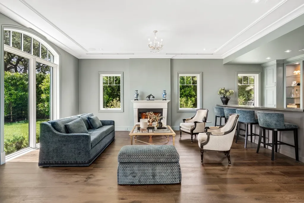 8840 SW 61st Court Home in Pinecrest, Florida. Explore this exquisite European-inspired home in N. Pinecrest, boasting 7 bedrooms and 7.5 bathrooms. From the formal living room with a wine cellar to the showstopper kitchen, this residence exudes elegance and sophistication.