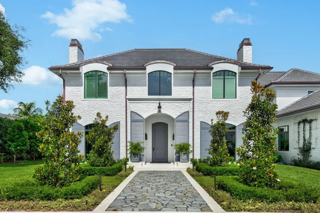 8840 SW 61st Court Home in Pinecrest, Florida. Explore this exquisite European-inspired home in N. Pinecrest, boasting 7 bedrooms and 7.5 bathrooms. From the formal living room with a wine cellar to the showstopper kitchen, this residence exudes elegance and sophistication.