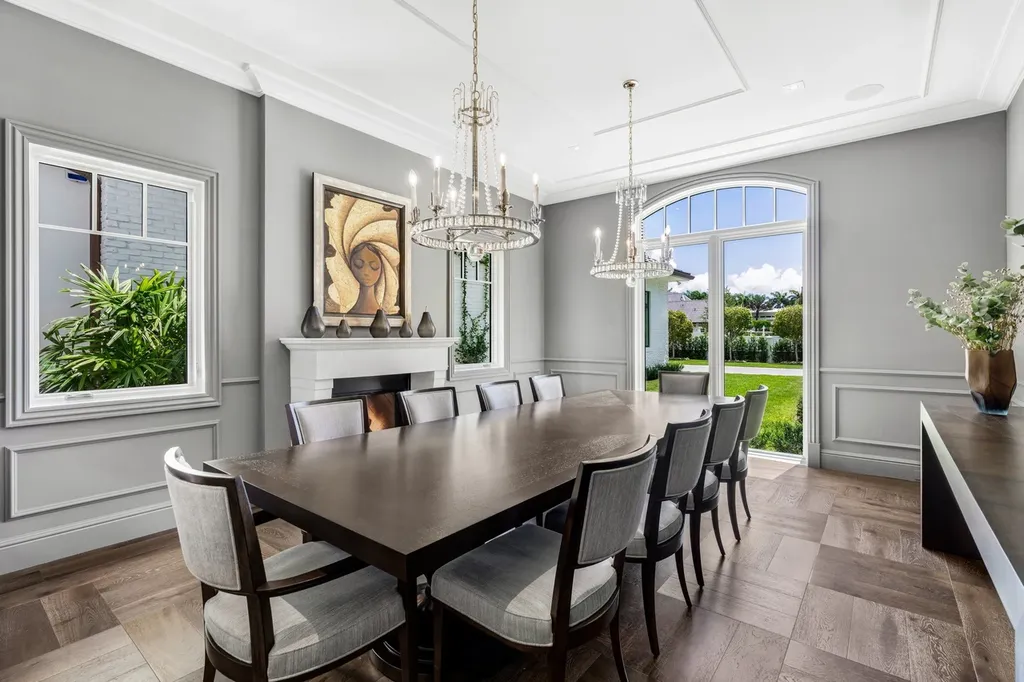 8840 SW 61st Court Home in Pinecrest, Florida. Explore this exquisite European-inspired home in N. Pinecrest, boasting 7 bedrooms and 7.5 bathrooms. From the formal living room with a wine cellar to the showstopper kitchen, this residence exudes elegance and sophistication.