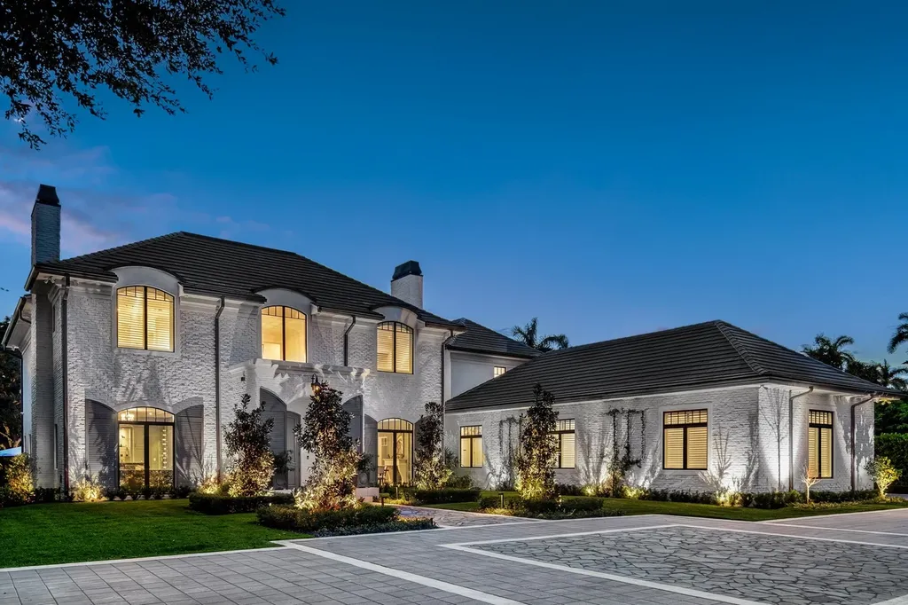 8840 SW 61st Court Home in Pinecrest, Florida. Explore this exquisite European-inspired home in N. Pinecrest, boasting 7 bedrooms and 7.5 bathrooms. From the formal living room with a wine cellar to the showstopper kitchen, this residence exudes elegance and sophistication.