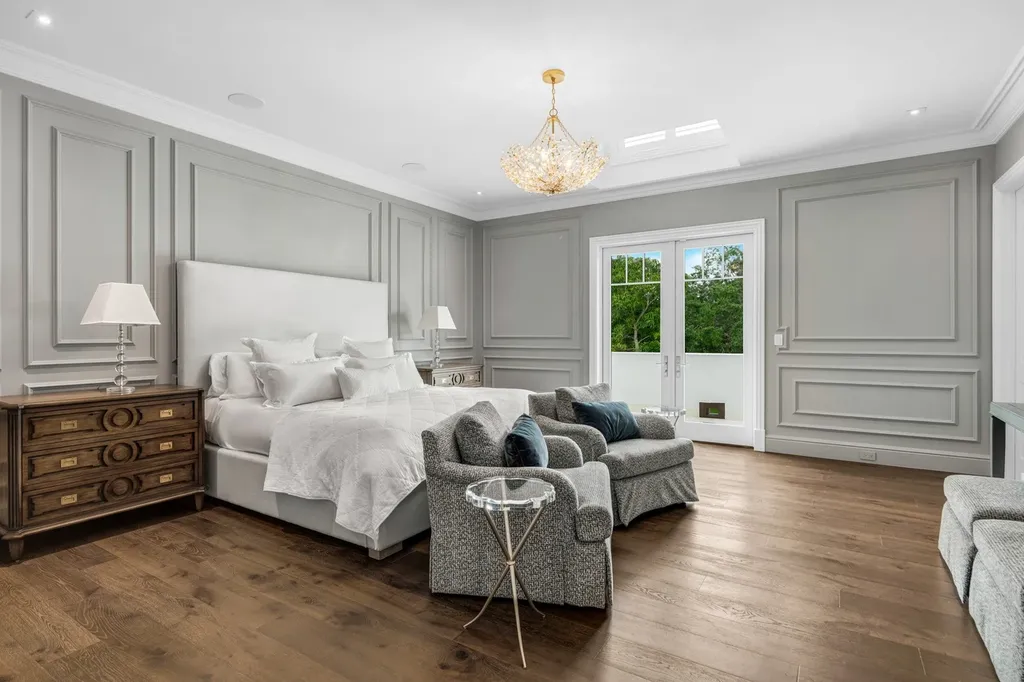 8840 SW 61st Court Home in Pinecrest, Florida. Explore this exquisite European-inspired home in N. Pinecrest, boasting 7 bedrooms and 7.5 bathrooms. From the formal living room with a wine cellar to the showstopper kitchen, this residence exudes elegance and sophistication.