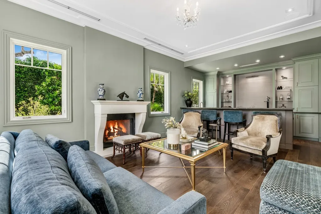 8840 SW 61st Court Home in Pinecrest, Florida. Explore this exquisite European-inspired home in N. Pinecrest, boasting 7 bedrooms and 7.5 bathrooms. From the formal living room with a wine cellar to the showstopper kitchen, this residence exudes elegance and sophistication.