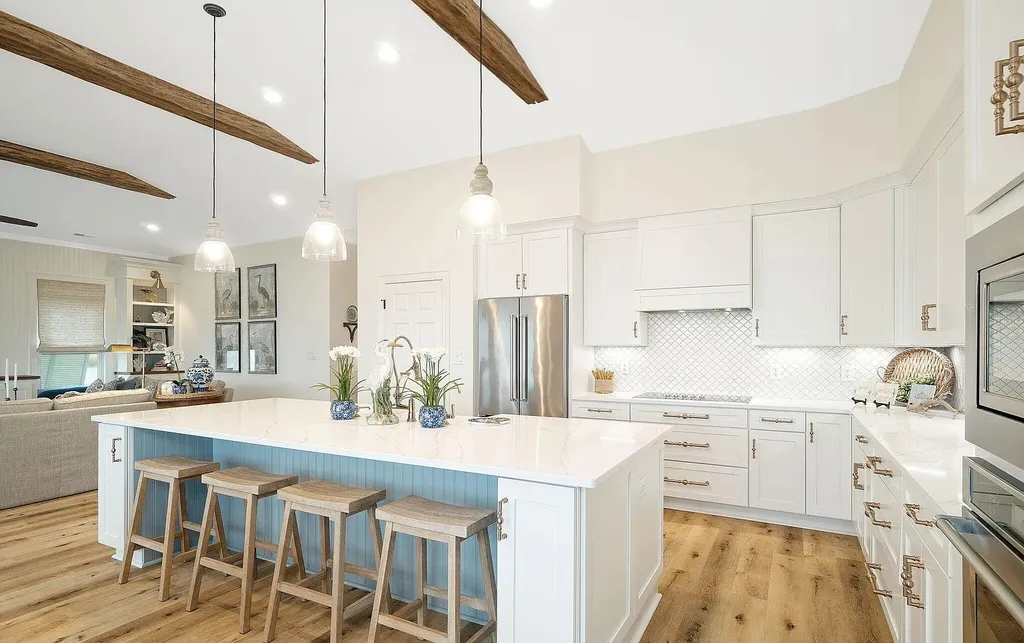 9721 Dolphin Ridge Road Home in Emerald Isle, North Carolina. Discover the epitome of oceanfront living in this exquisite Dolphin Ridge home, where luxury and customization intertwine to create a one-of-a-kind island sanctuary. Immerse yourself in the coastal lifestyle as you step into this beautifully furnished abode, thoughtfully tailored by the builder/owners to offer a seamless blend of comfort and sophistication.