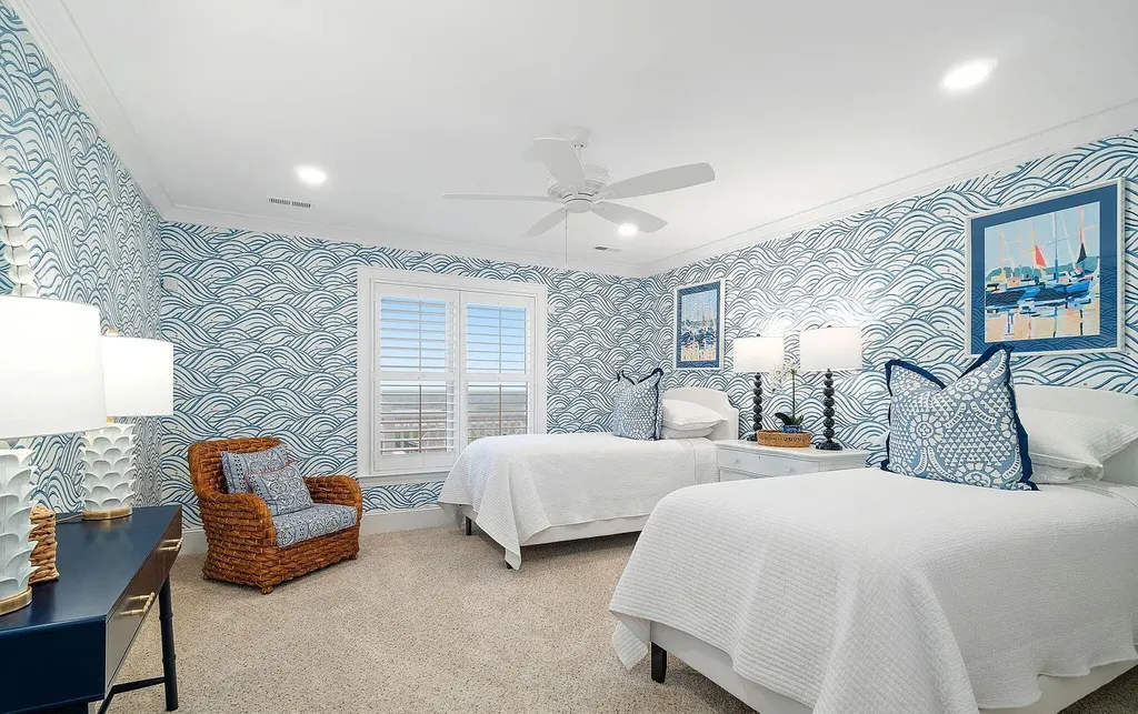 9721 Dolphin Ridge Road Home in Emerald Isle, North Carolina. Discover the epitome of oceanfront living in this exquisite Dolphin Ridge home, where luxury and customization intertwine to create a one-of-a-kind island sanctuary. Immerse yourself in the coastal lifestyle as you step into this beautifully furnished abode, thoughtfully tailored by the builder/owners to offer a seamless blend of comfort and sophistication.