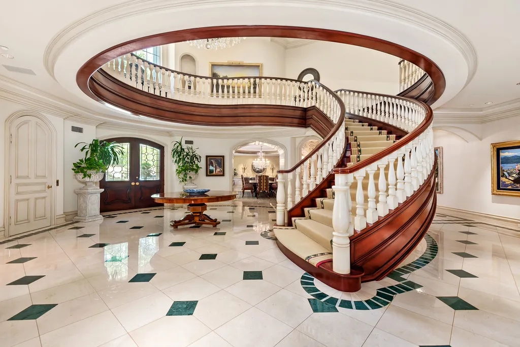 997 Brook Meadow Court Home in Westlake Village, California. Experience the epitome of luxury in this French country masterpiece located in the prestigious North Ranch Country Club Estates. Designed by renowned architect Ron Firestone, this iconic estate features a grand entry, theater, elevator, formal dining, bonus room, wine cellar, and a stunning primary suite. 