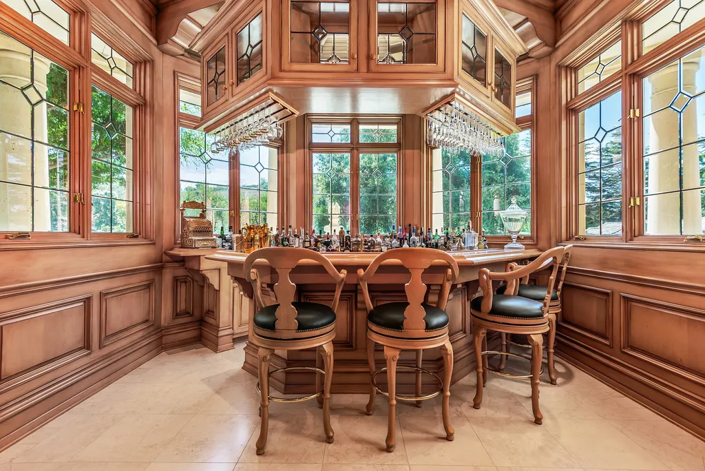 997 Brook Meadow Court Home in Westlake Village, California. Experience the epitome of luxury in this French country masterpiece located in the prestigious North Ranch Country Club Estates. Designed by renowned architect Ron Firestone, this iconic estate features a grand entry, theater, elevator, formal dining, bonus room, wine cellar, and a stunning primary suite. 