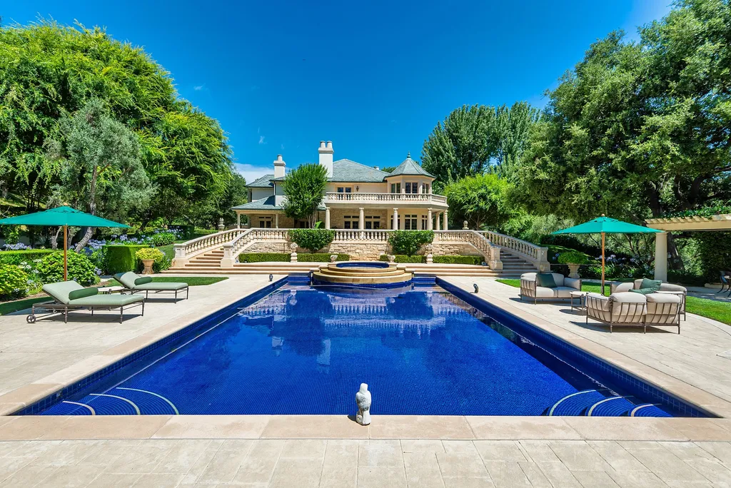997 Brook Meadow Court Home in Westlake Village, California. Experience the epitome of luxury in this French country masterpiece located in the prestigious North Ranch Country Club Estates. Designed by renowned architect Ron Firestone, this iconic estate features a grand entry, theater, elevator, formal dining, bonus room, wine cellar, and a stunning primary suite. 