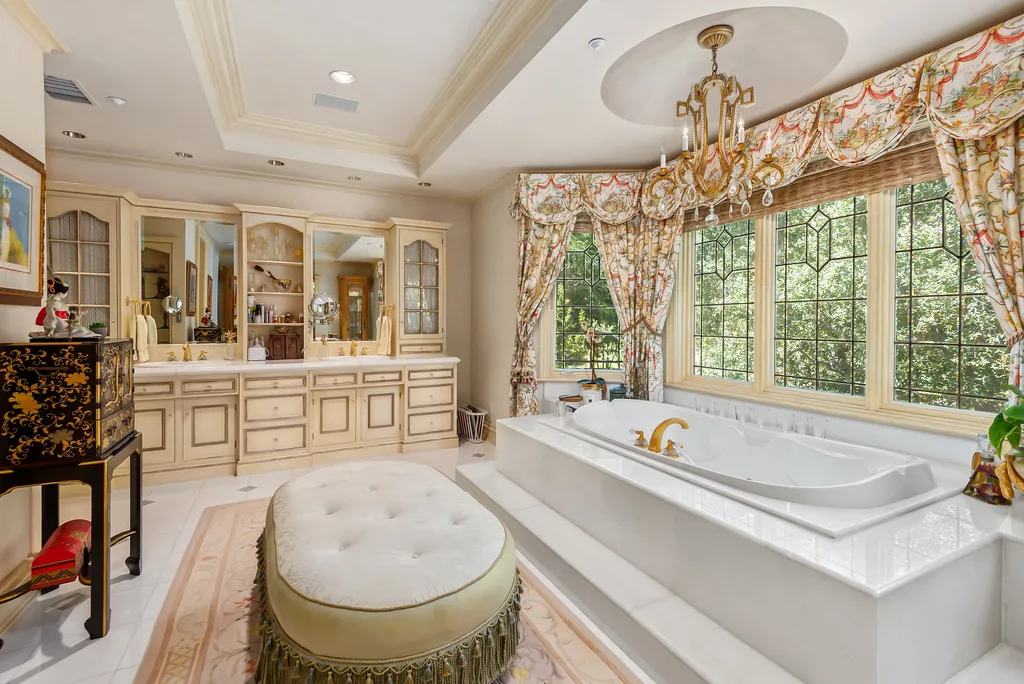 997 Brook Meadow Court Home in Westlake Village, California. Experience the epitome of luxury in this French country masterpiece located in the prestigious North Ranch Country Club Estates. Designed by renowned architect Ron Firestone, this iconic estate features a grand entry, theater, elevator, formal dining, bonus room, wine cellar, and a stunning primary suite. 