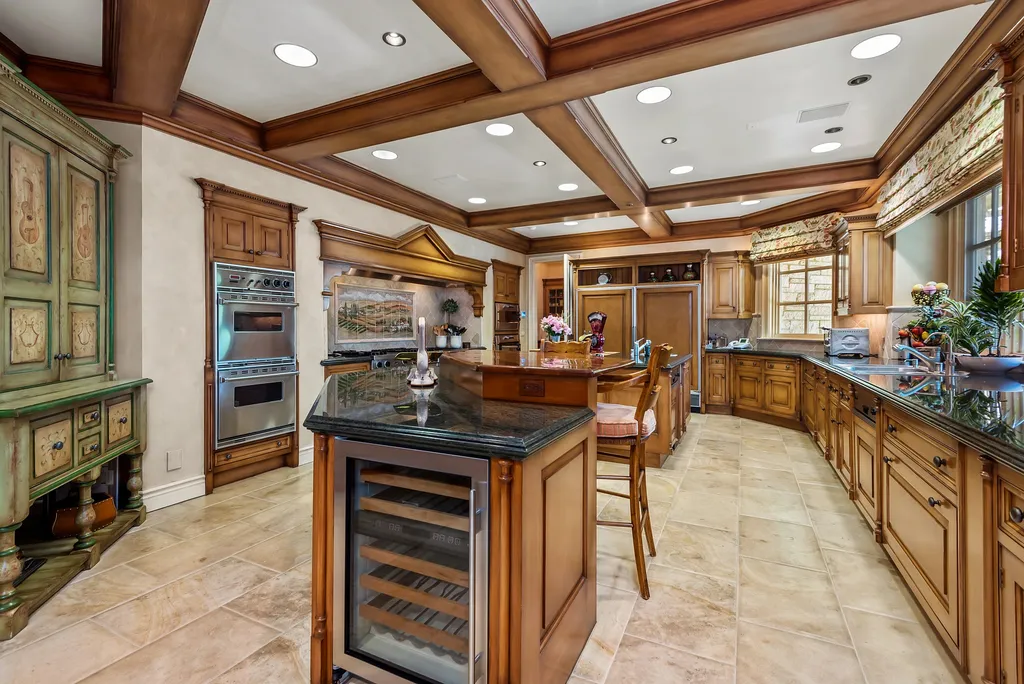 997 Brook Meadow Court Home in Westlake Village, California. Experience the epitome of luxury in this French country masterpiece located in the prestigious North Ranch Country Club Estates. Designed by renowned architect Ron Firestone, this iconic estate features a grand entry, theater, elevator, formal dining, bonus room, wine cellar, and a stunning primary suite. 