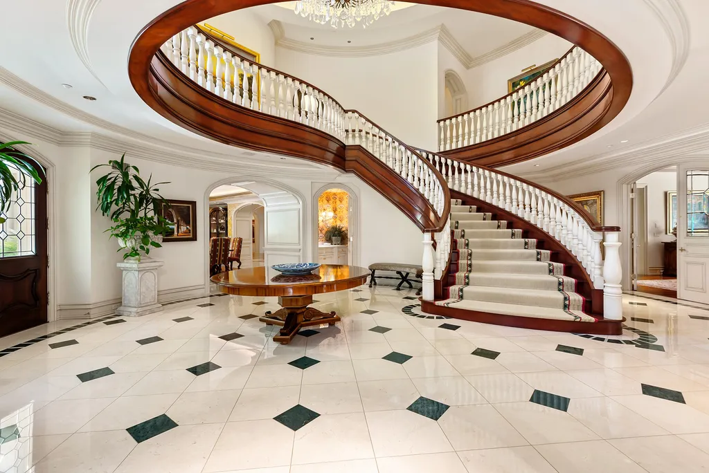 997 Brook Meadow Court Home in Westlake Village, California. Experience the epitome of luxury in this French country masterpiece located in the prestigious North Ranch Country Club Estates. Designed by renowned architect Ron Firestone, this iconic estate features a grand entry, theater, elevator, formal dining, bonus room, wine cellar, and a stunning primary suite. 