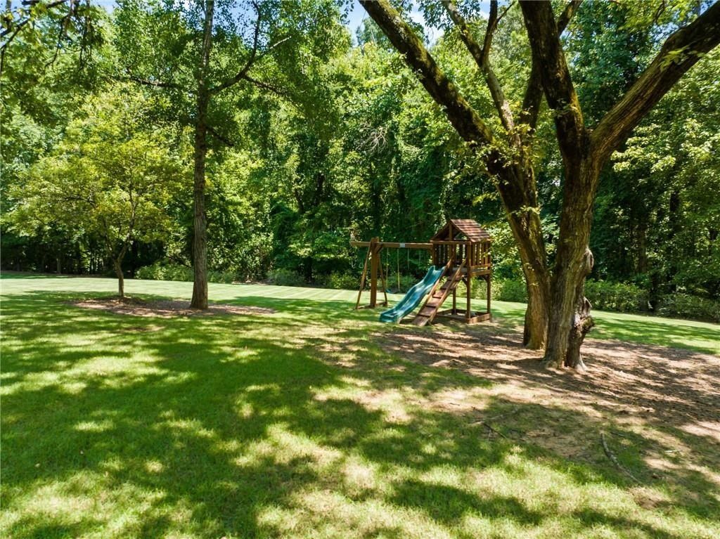 Sandy Springs Architectural Gem: Magnificent $12.995 Million Symmetrical Stone Masterpiece