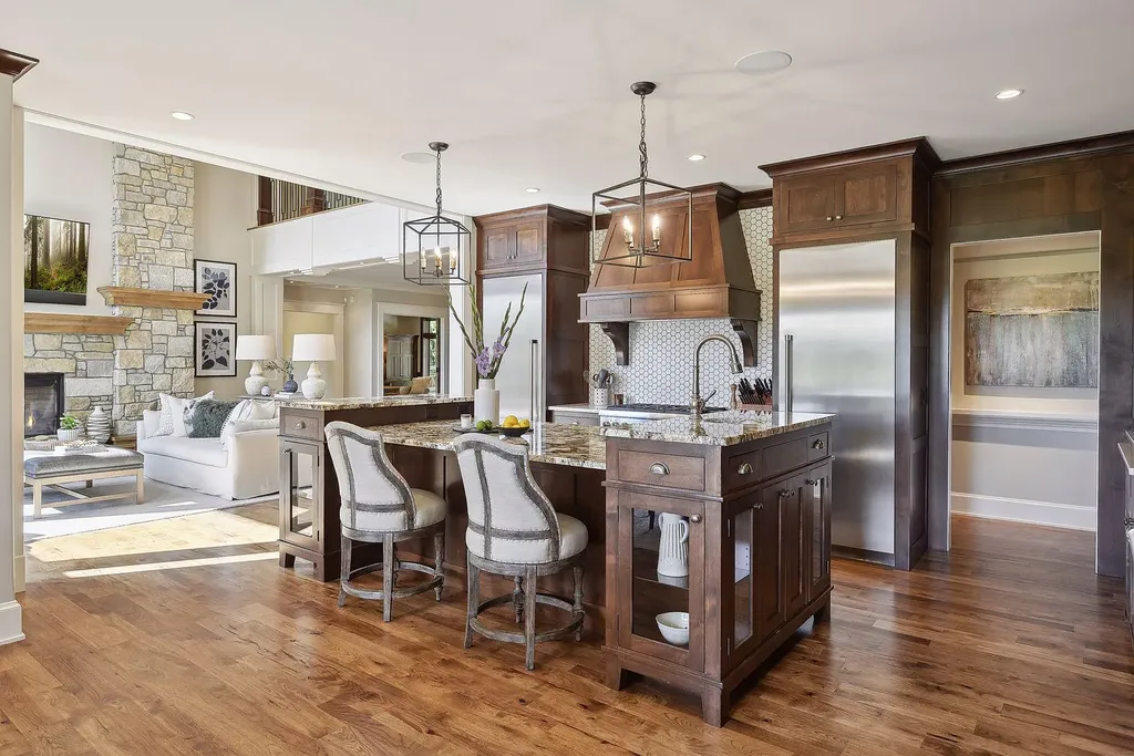 10 Myrtlewood Road Home in Wayzata, Minnesota. This magnificent custom-built home is a true masterpiece, perfectly blending sophistication and luxury with everyday comfort and warmth. From the moment you step inside, you'll be captivated by the quality and unique features that define this exceptional residence.
