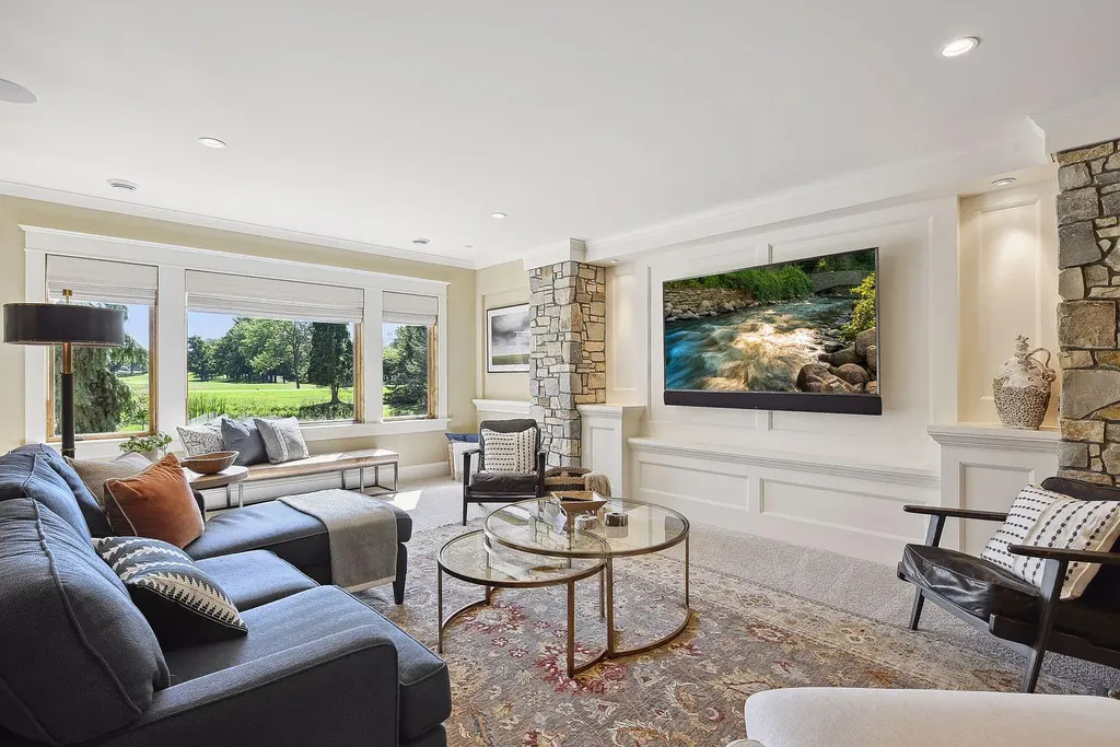 10 Myrtlewood Road Home in Wayzata, Minnesota. This magnificent custom-built home is a true masterpiece, perfectly blending sophistication and luxury with everyday comfort and warmth. From the moment you step inside, you'll be captivated by the quality and unique features that define this exceptional residence.