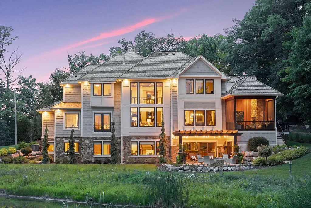10 Myrtlewood Road Home in Wayzata, Minnesota. This magnificent custom-built home is a true masterpiece, perfectly blending sophistication and luxury with everyday comfort and warmth. From the moment you step inside, you'll be captivated by the quality and unique features that define this exceptional residence.