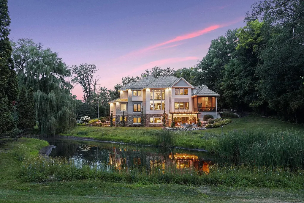 10 Myrtlewood Road Home in Wayzata, Minnesota. This magnificent custom-built home is a true masterpiece, perfectly blending sophistication and luxury with everyday comfort and warmth. From the moment you step inside, you'll be captivated by the quality and unique features that define this exceptional residence.