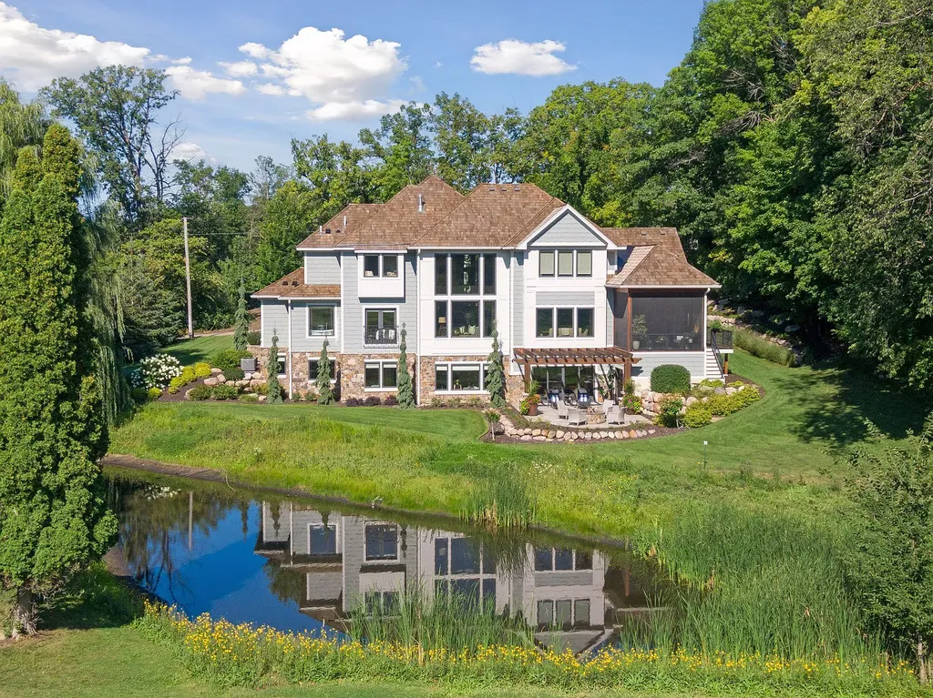 10 Myrtlewood Road Home in Wayzata, Minnesota. This magnificent custom-built home is a true masterpiece, perfectly blending sophistication and luxury with everyday comfort and warmth. From the moment you step inside, you'll be captivated by the quality and unique features that define this exceptional residence.